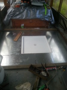 Steel floor sheeting to protect timber floor from road debris.