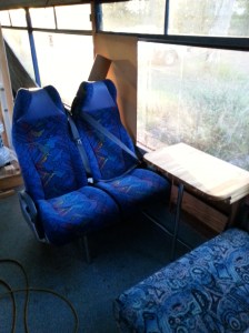 I have replaced the forward facing seats with a Coach seat, these incorporate Seat belts which meets the transit seating requirements.