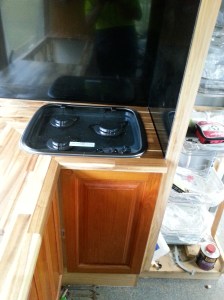 Both sink & Cook top are fitted only trim materials to seal the splash backs & Micro wave Cabinets to be fitted.