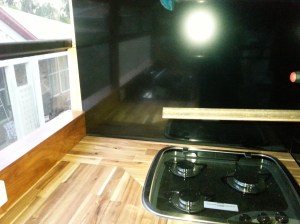 Cook top in place first coat of oil has been applied to Bench.