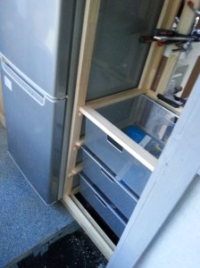 Fridge location in relative to this Cabinet.
